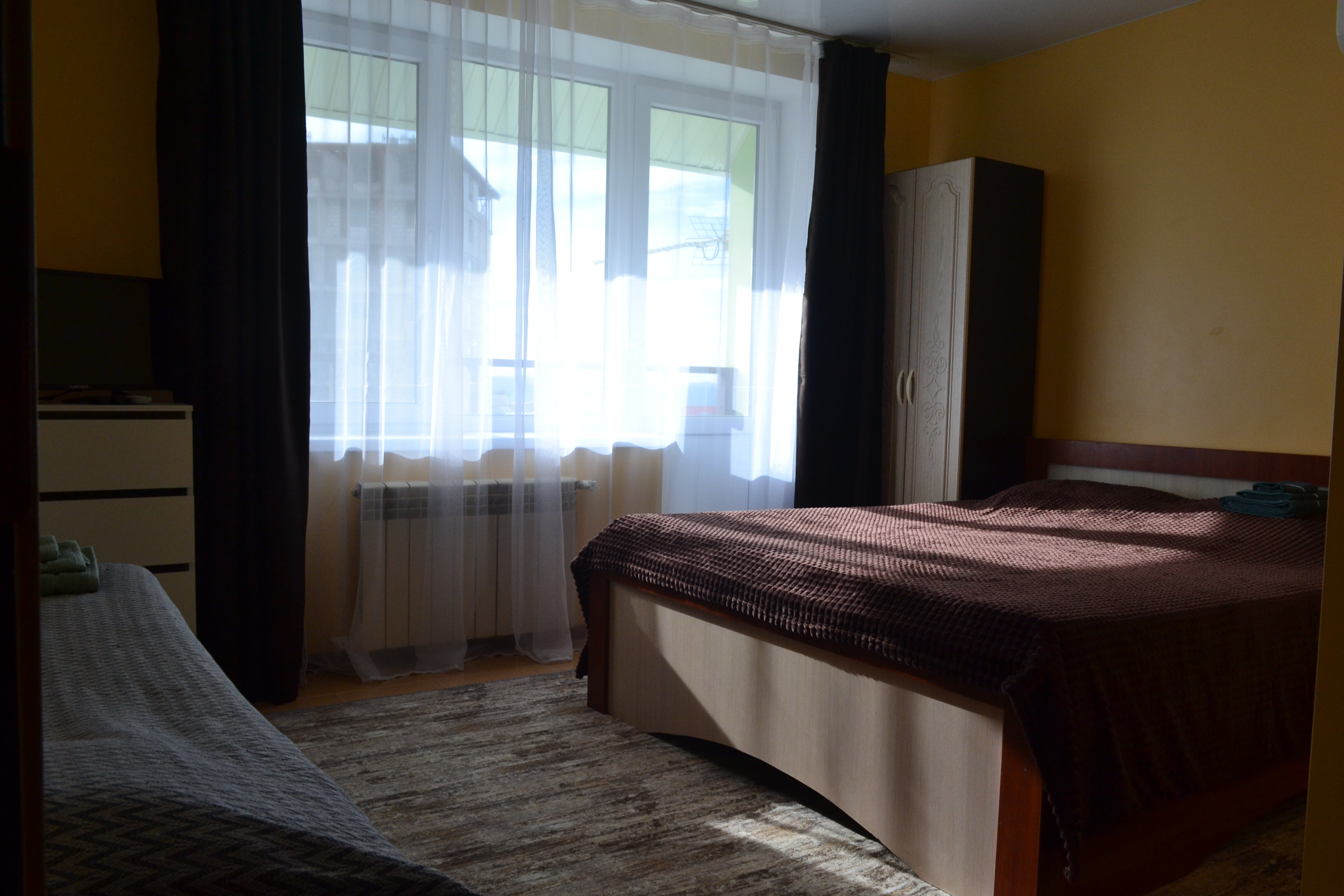 Трехместный номер с балконом