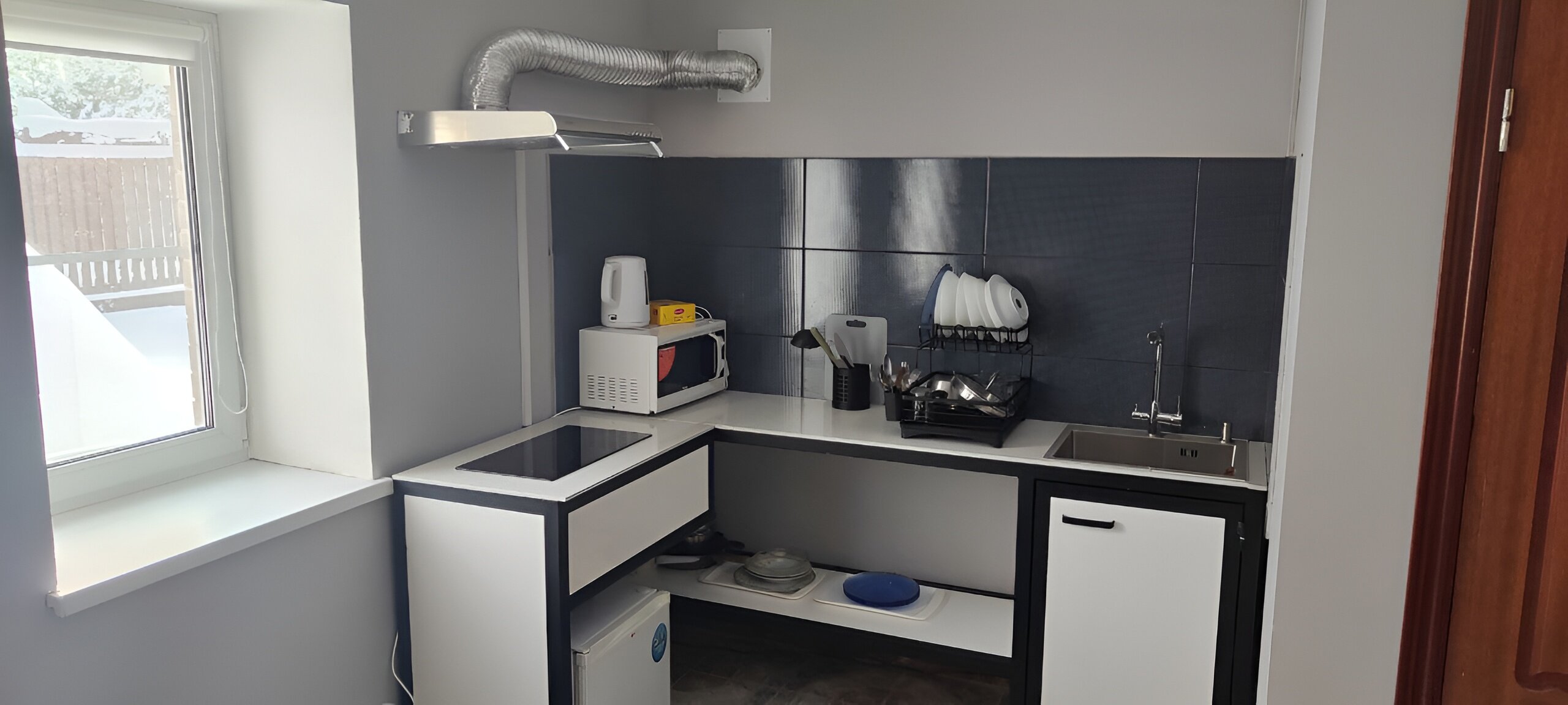 Дом с двумя спальнями сауной и кухней