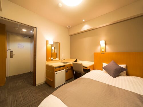 Номер для некурящих с полутораспальной кроватью в Dormy Inn Toyama Natural Hot Spring