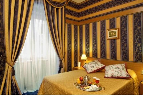 Стандартный четырехместный номер в Hotel Andreotti