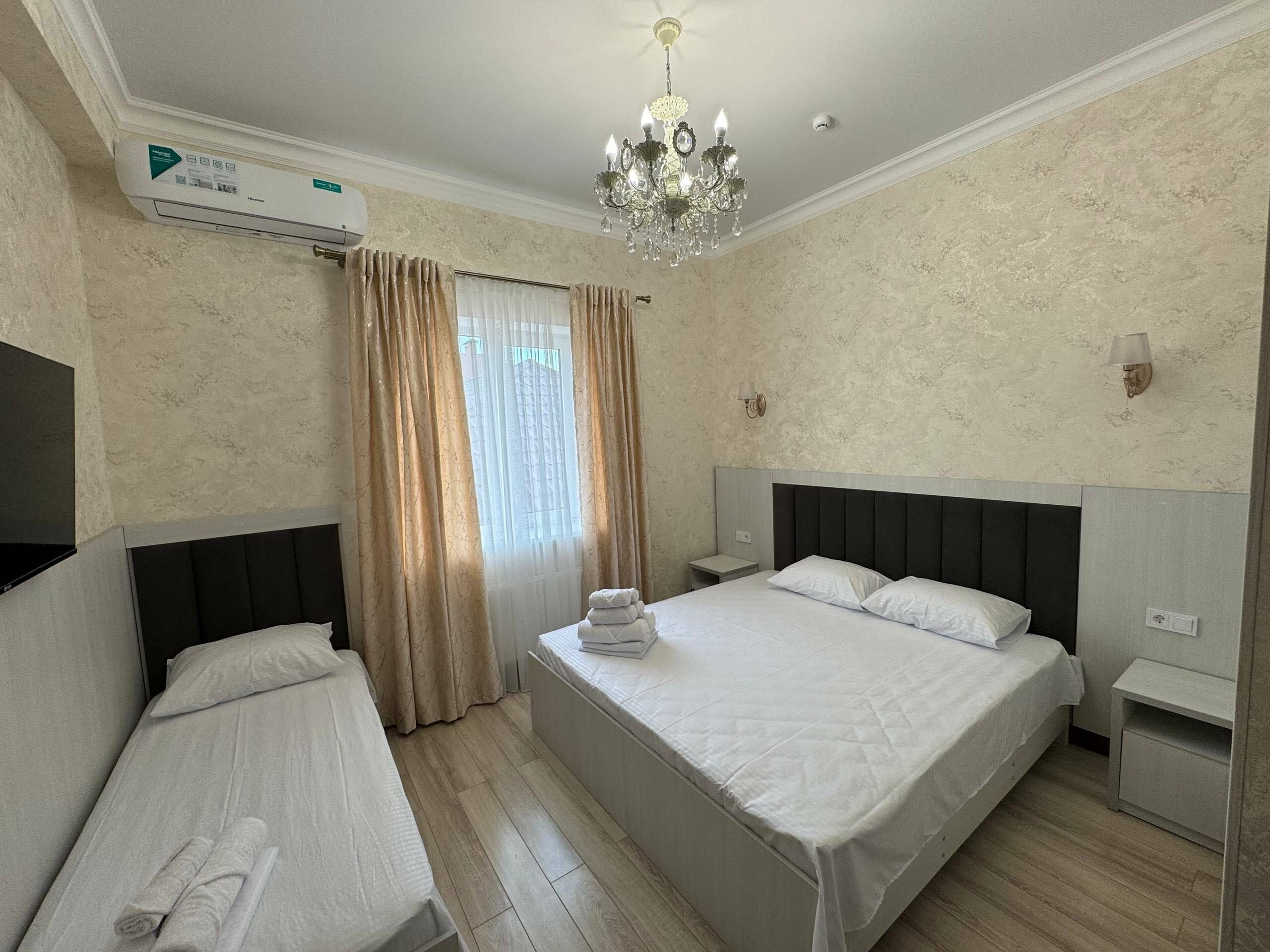 Трехместный номер Делюкс