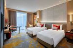 Family Room (1 King Bed and 2 Twin Beds) в Sofitel Singapore City Centre