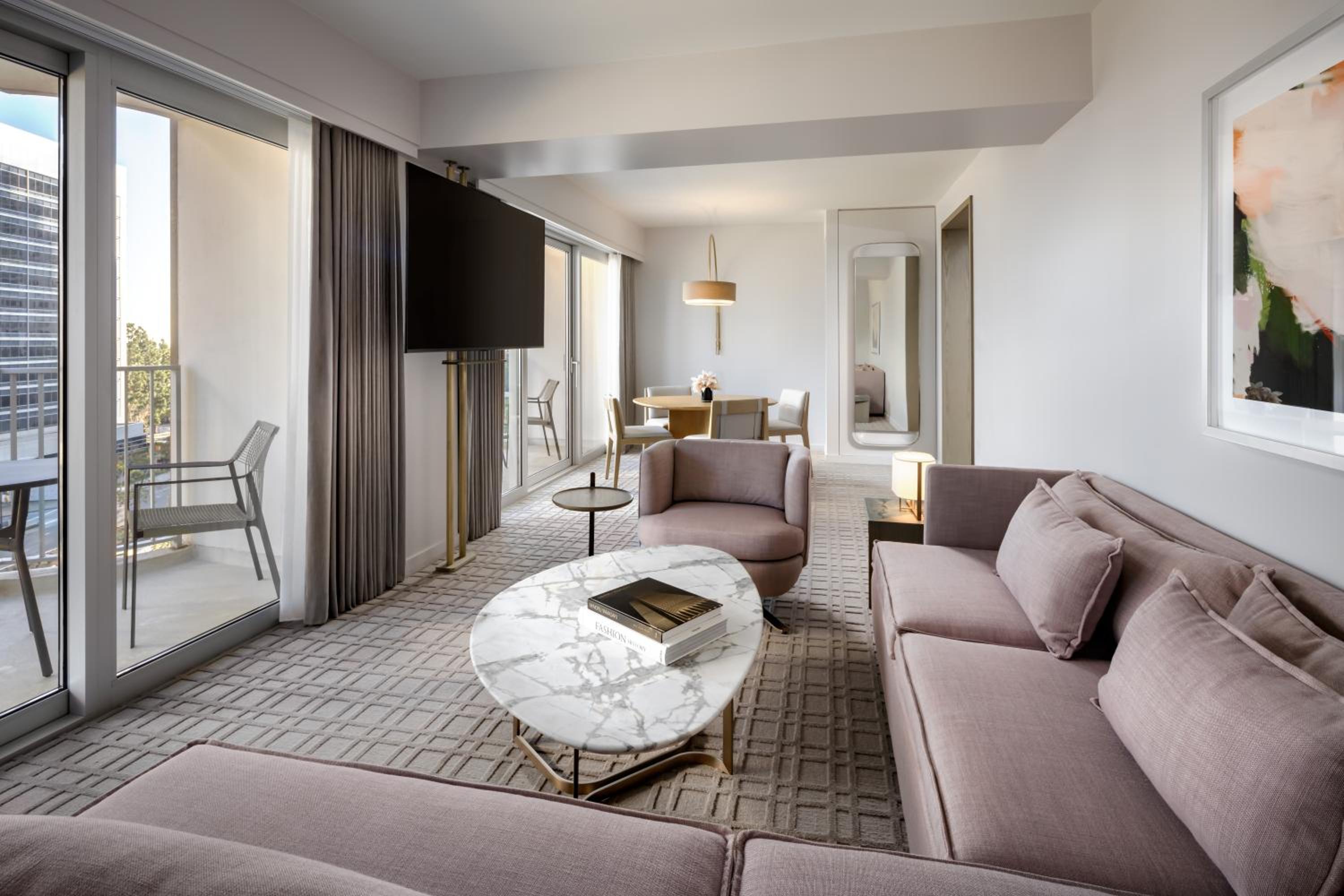 Signature One Bedroom Corner King Suite with Three Balconies and Sofabed