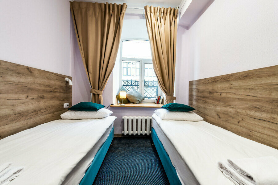 Двухместная комната с 2 односпальными кроватями и с собственной ванной комнатой