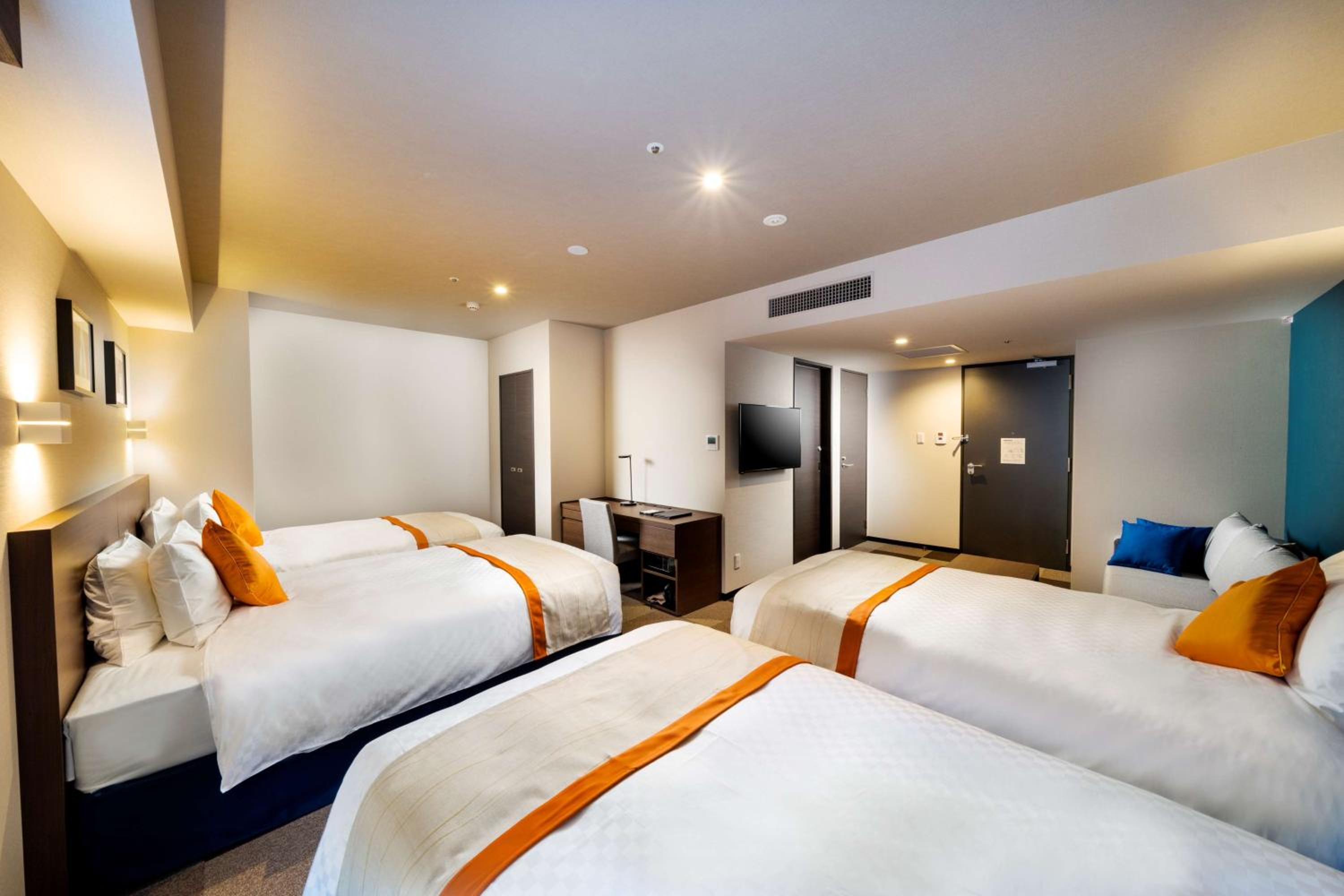 Quadruple Room with four single beds