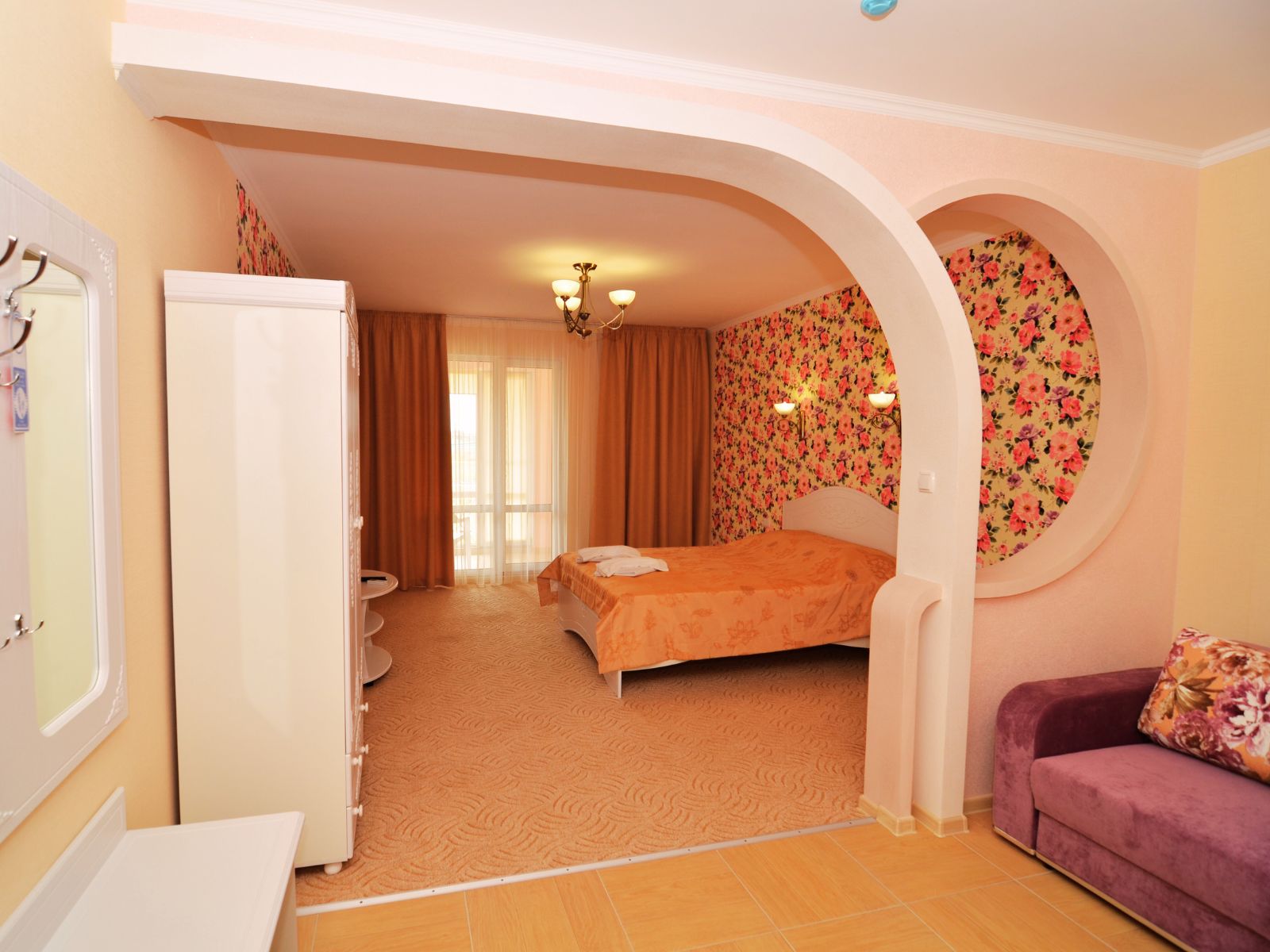 Трехместный номер Делюкс