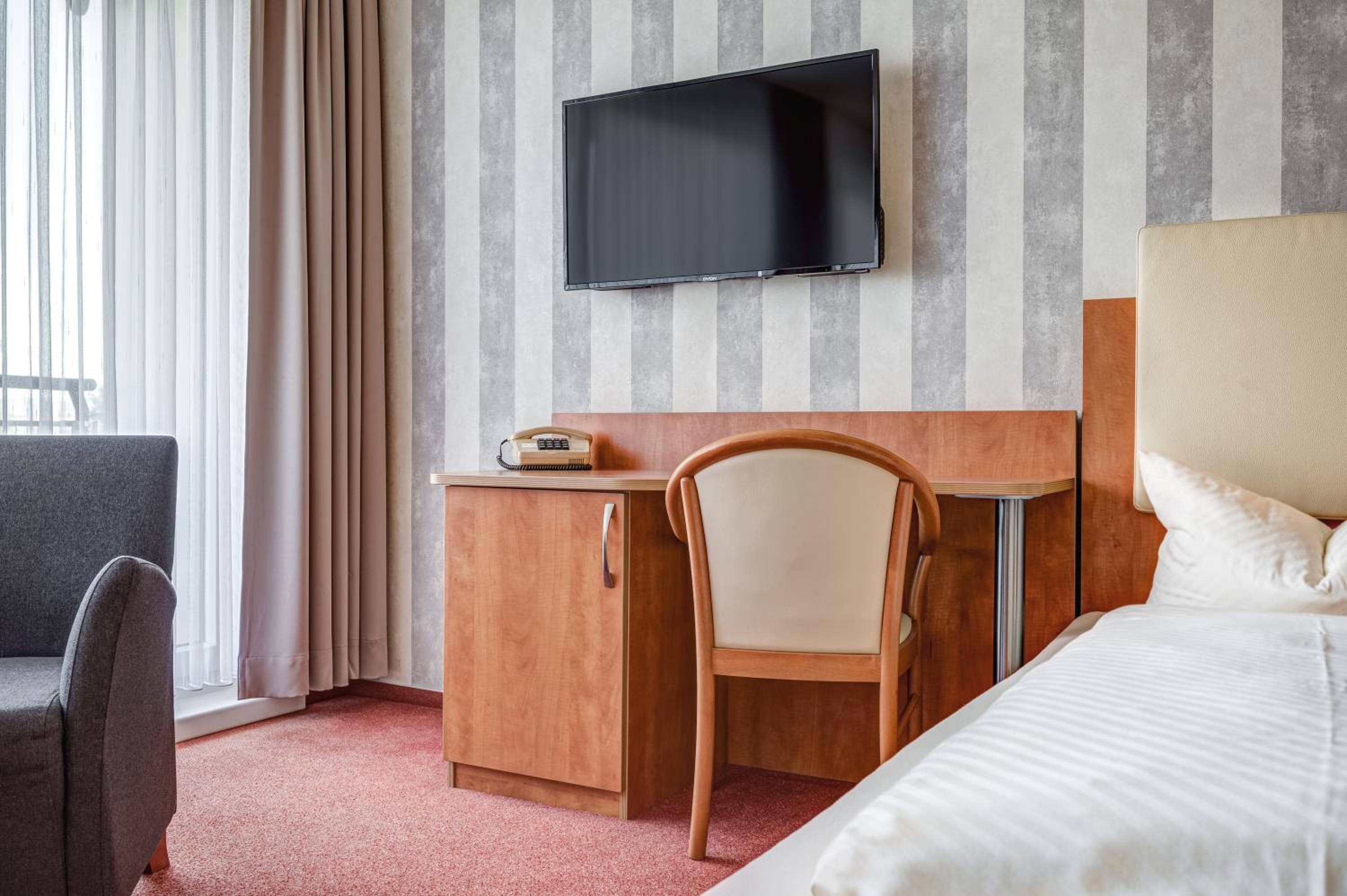 Triple Room (3 Adults or 2 Adults + 1 Child)