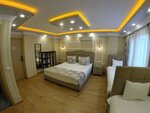 Четырехместный номер «Делюкс» в Meydan Suites