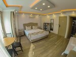Трехместный номер «Делюкс» в Meydan Suites