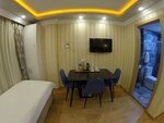 Четырехместный номер «Делюкс» в Meydan Suites