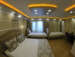 Четырехместный номер «Делюкс» в Meydan Suites