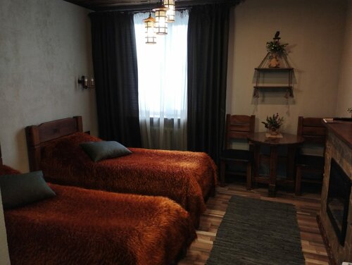 Улучшенный двухместный номер с 2 отдельными кроватями в Дилижанс