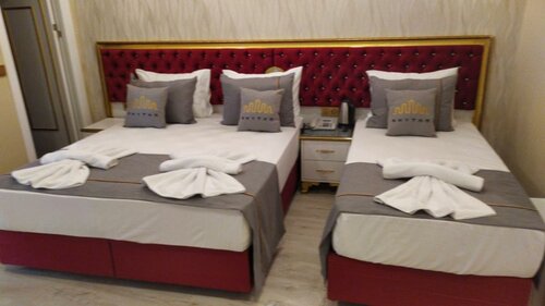 Triple Room в Rhythm Hotel