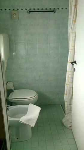 Четырёхместный номер Standard в Hotel Cortina