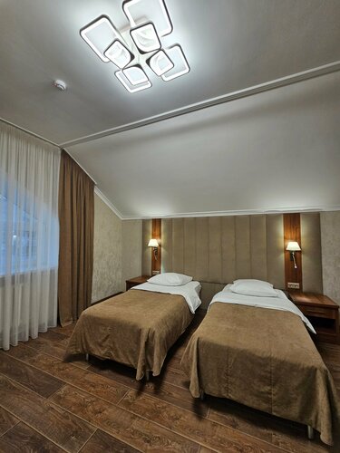 Четырехместный номер Делюкс