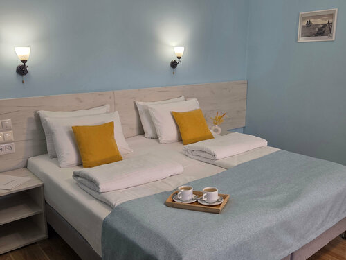 Улучшенный номер с кроватью размера «king-size» или 2 отдельными кроватями