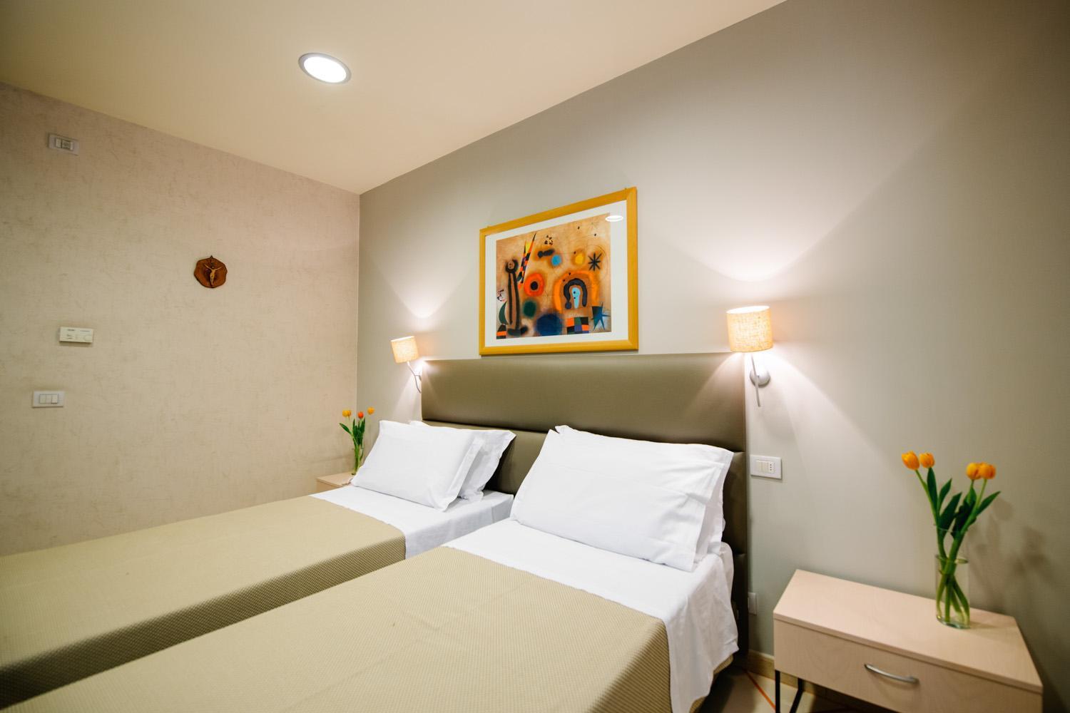 Deluxe Room with One Queen and Two Single Beds - Non-Smoking