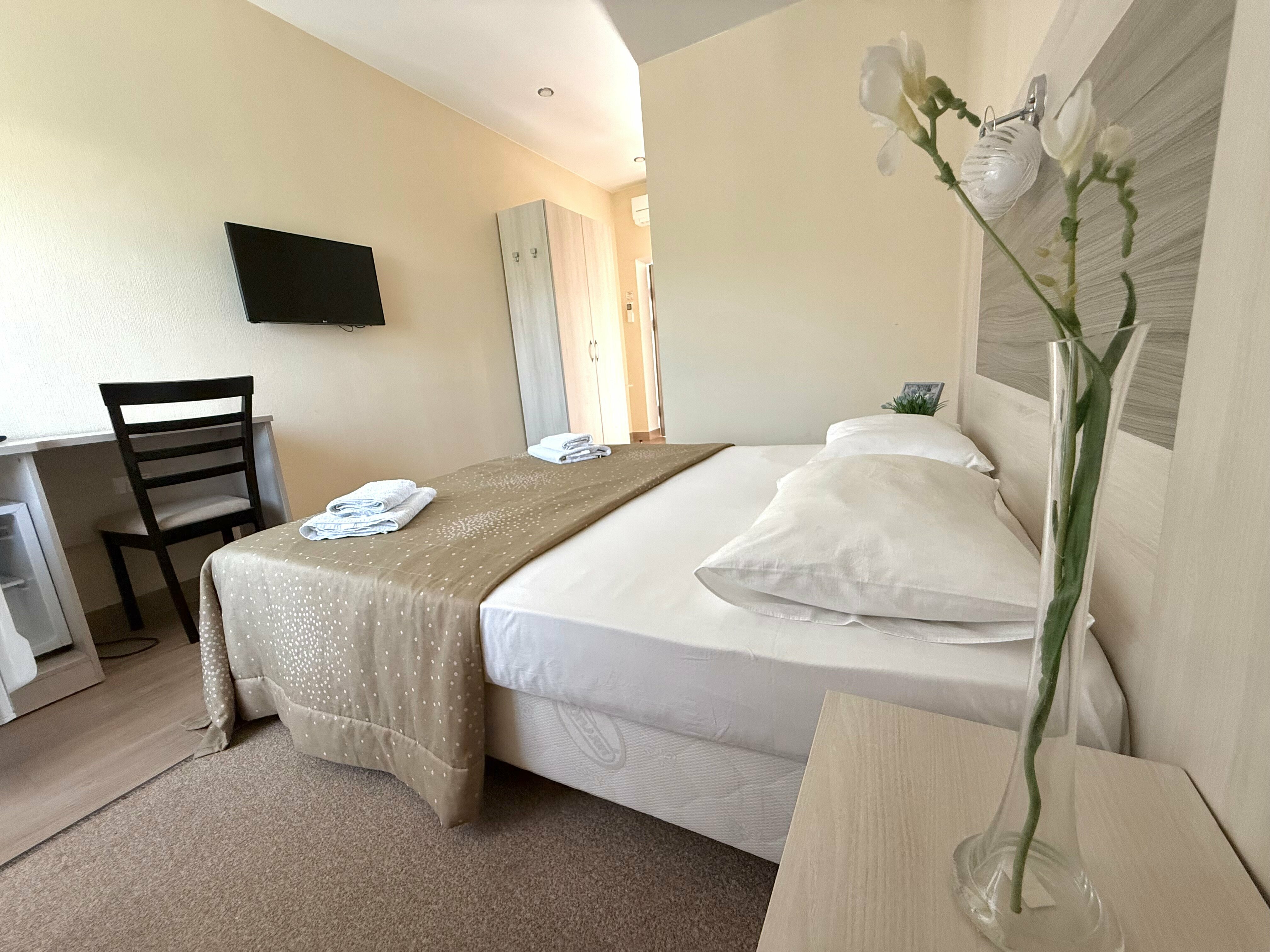 Улучшенный номер с кроватью размера «king-size» или 2 отдельными кроватями