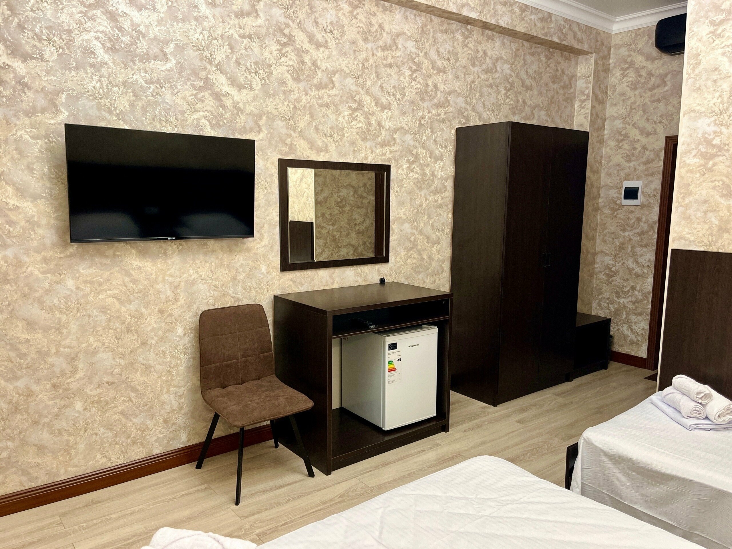 Трехместный номер Делюкс