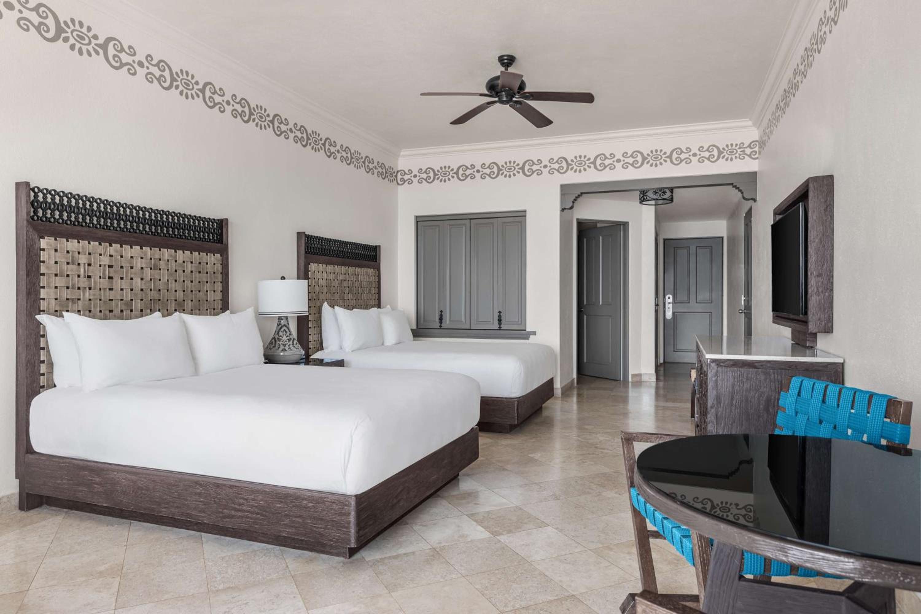 Deluxe Oceanfront Queen Room with Two Queen Beds and Balcony