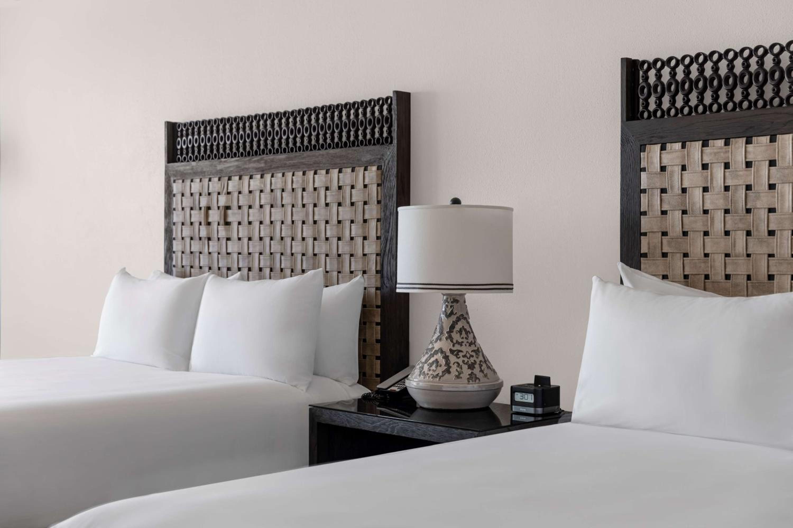 Deluxe Oceanfront Queen Room with Two Queen Beds and Balcony