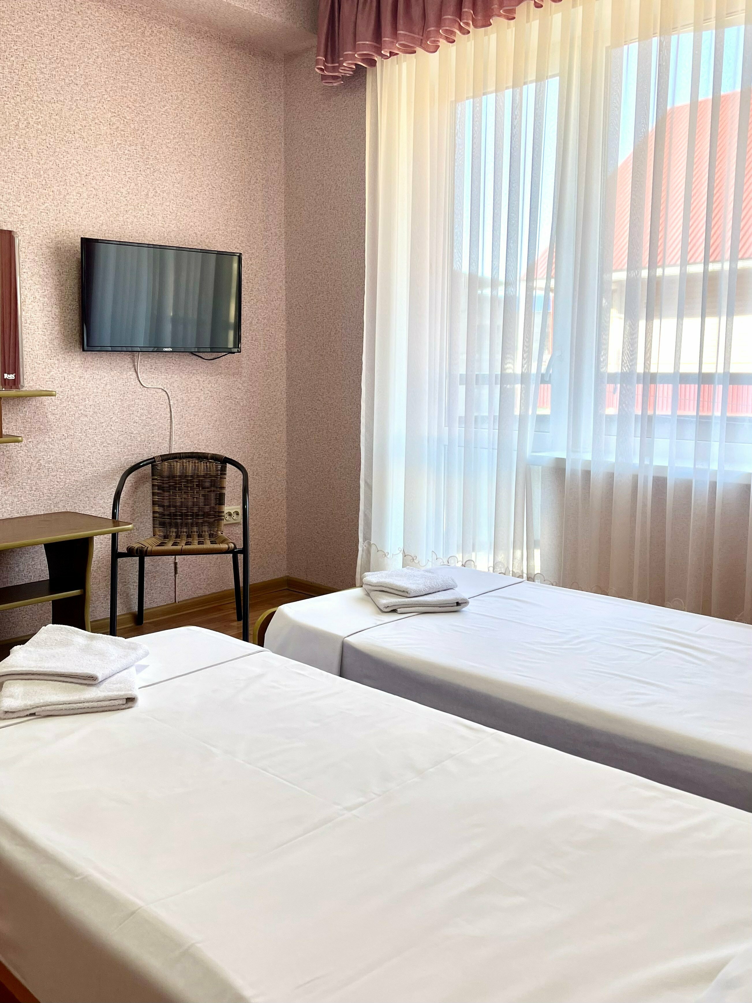 Двухместный номер Делюкс с 2 двуспальными кроватями