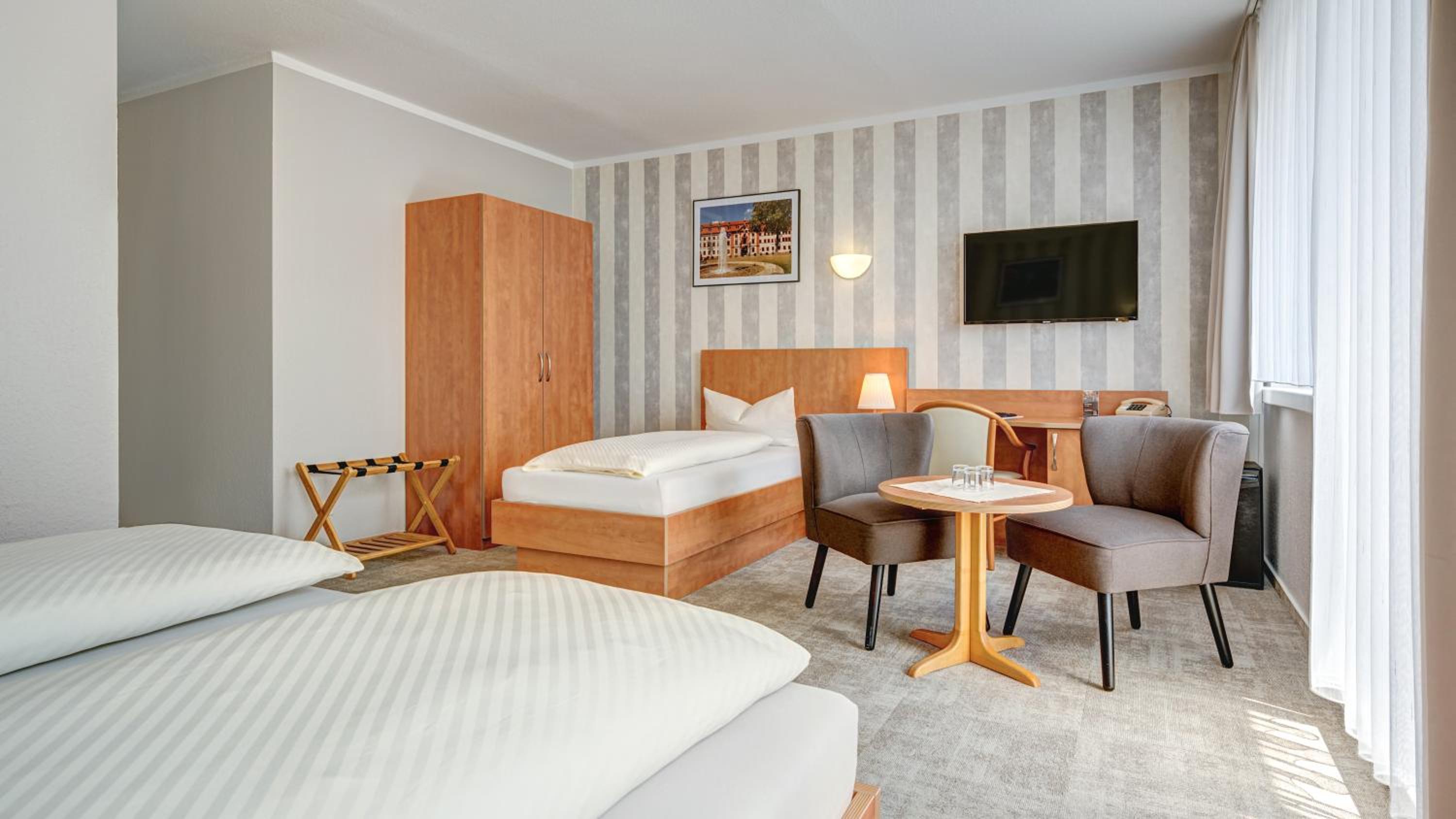 Triple Room (3 Adults or 2 Adults + 1 Child)