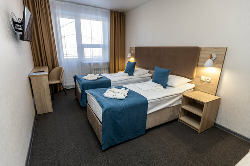 Двухместный номер с 2 отдельными кроватями и балконом