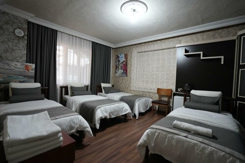 Single Bed in Female Dormitory Room в Ozen Turku Hotel
