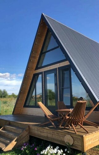 Треугольный дом