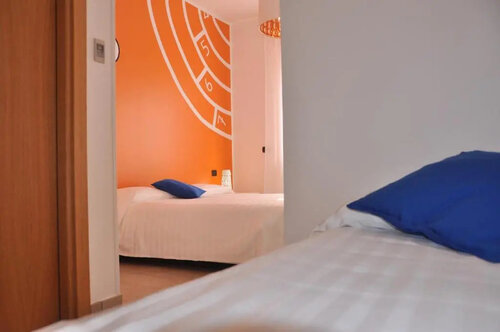 Четырёхместный номер Standard двуспальная кровать в Hotel Lo Scoiattolo