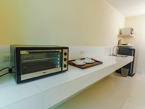 Studio в Tamarind Garden Hotel