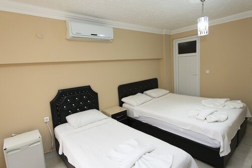 Семейный трехместный номер в Green Peace Hotel