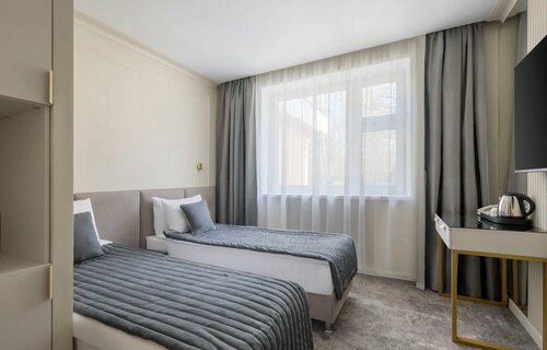 Улучшенный номер с кроватью размера «king-size» или 2 отдельными кроватями