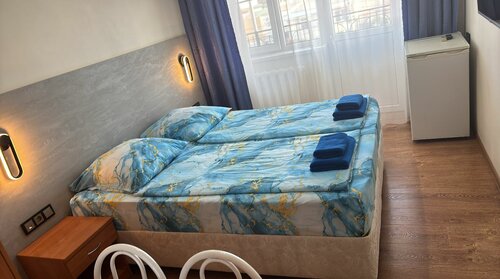 Номер с балконом  - двуспальная или 2 односпальные кровати