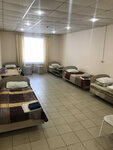 Кровать в общем номере с пятью кроватями в Парнас
