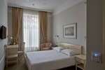 Стандартный с двухспальной кроватью в Astor Hotel