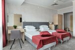 Номер Бизнес ( 2 односпальные кровати. 25м2 с балконом ) в People Stadium Hotel