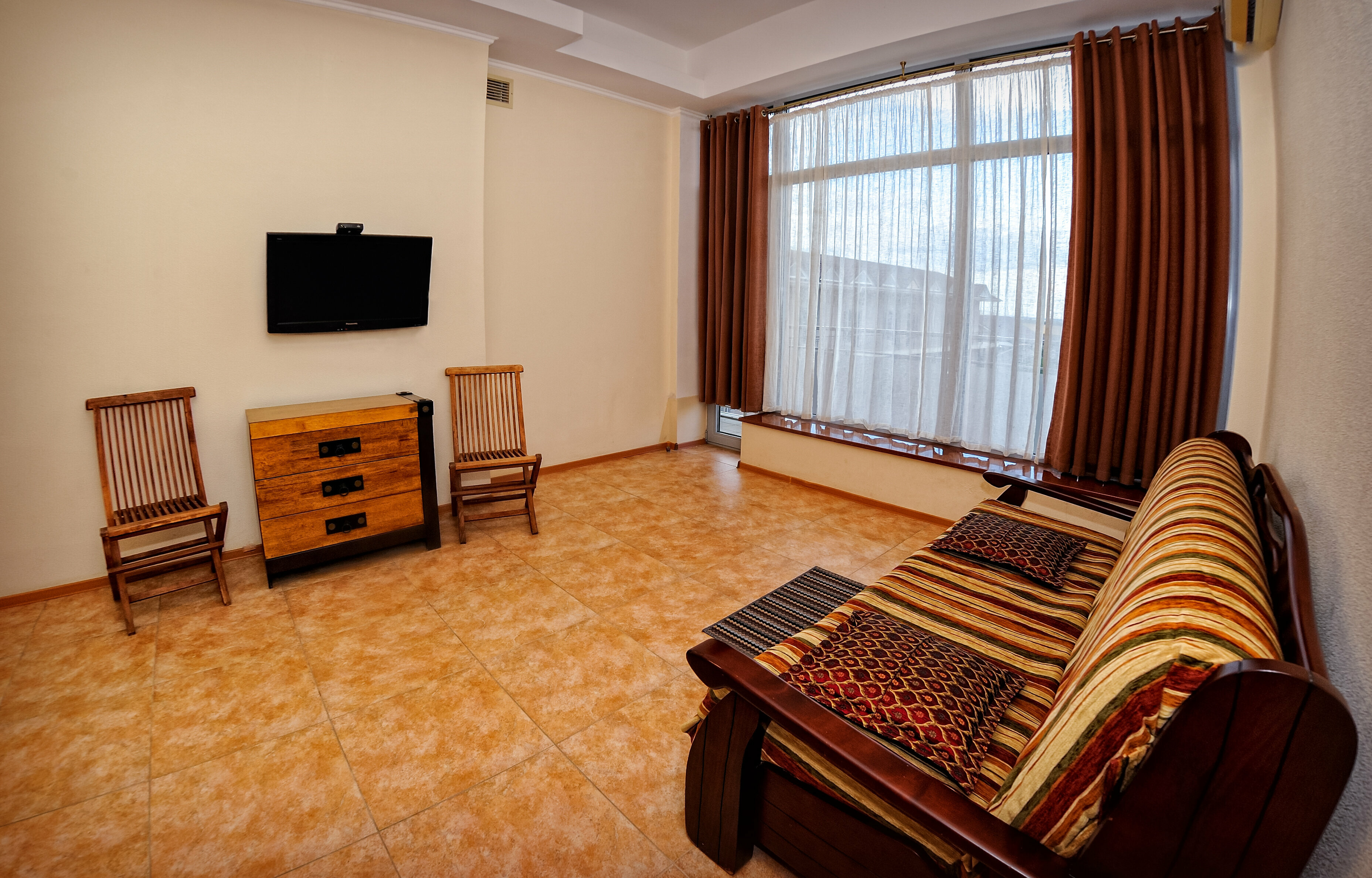 Четырехместный номер с видом на сад