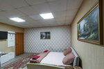 Номер "Комфорт" с двуспальной кроватью и двумя дополнительными местами в Славянка