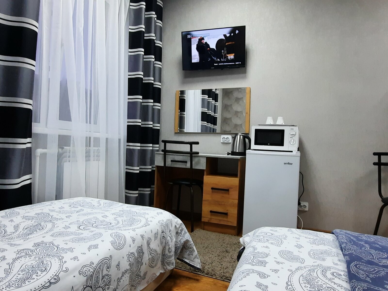 Улучшенный двухместный номер с 2 отдельными кроватями