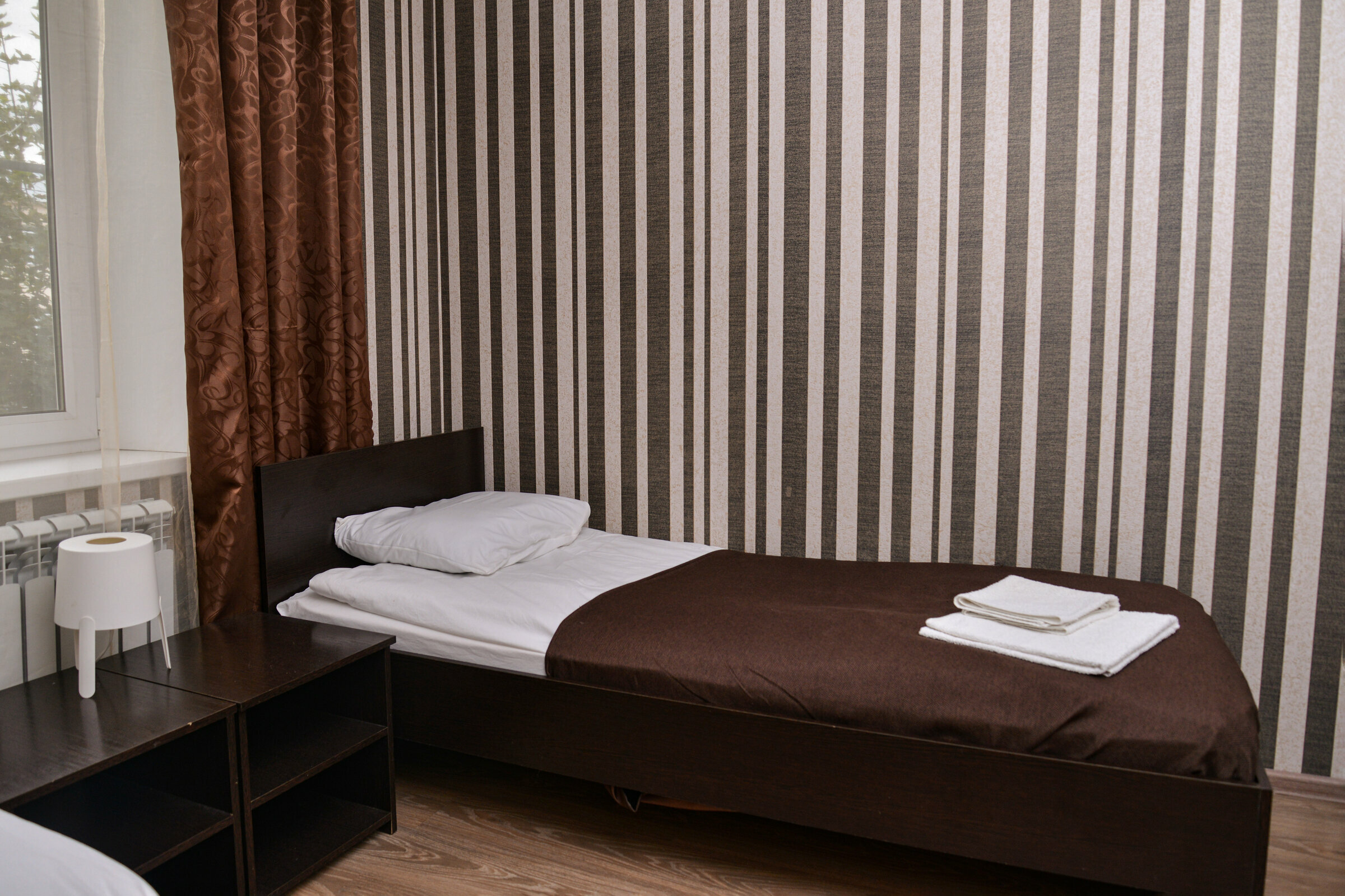 Просторный двухместный номер с 2 отдельными кроватями