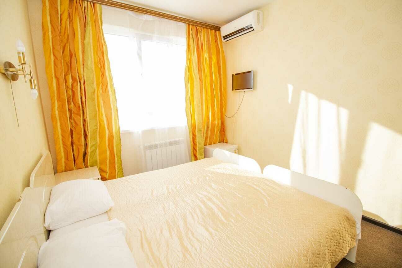 Двухместный номер с 2 отдельными кроватями и ванной