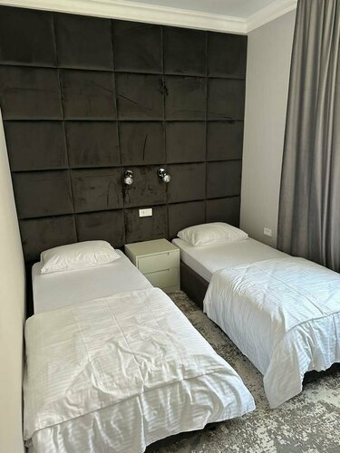 Просторный двухместный номер с 2 отдельными кроватями