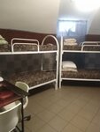 Кровать в общем 6-местном номере для женщин в Хостел в центре Петербурга