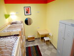 Кровать в общем номере для мужчин с 4 кроватями в Пионер