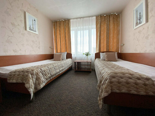 Двухместный номер с 2 отдельными кроватями и общей ванной комнатой