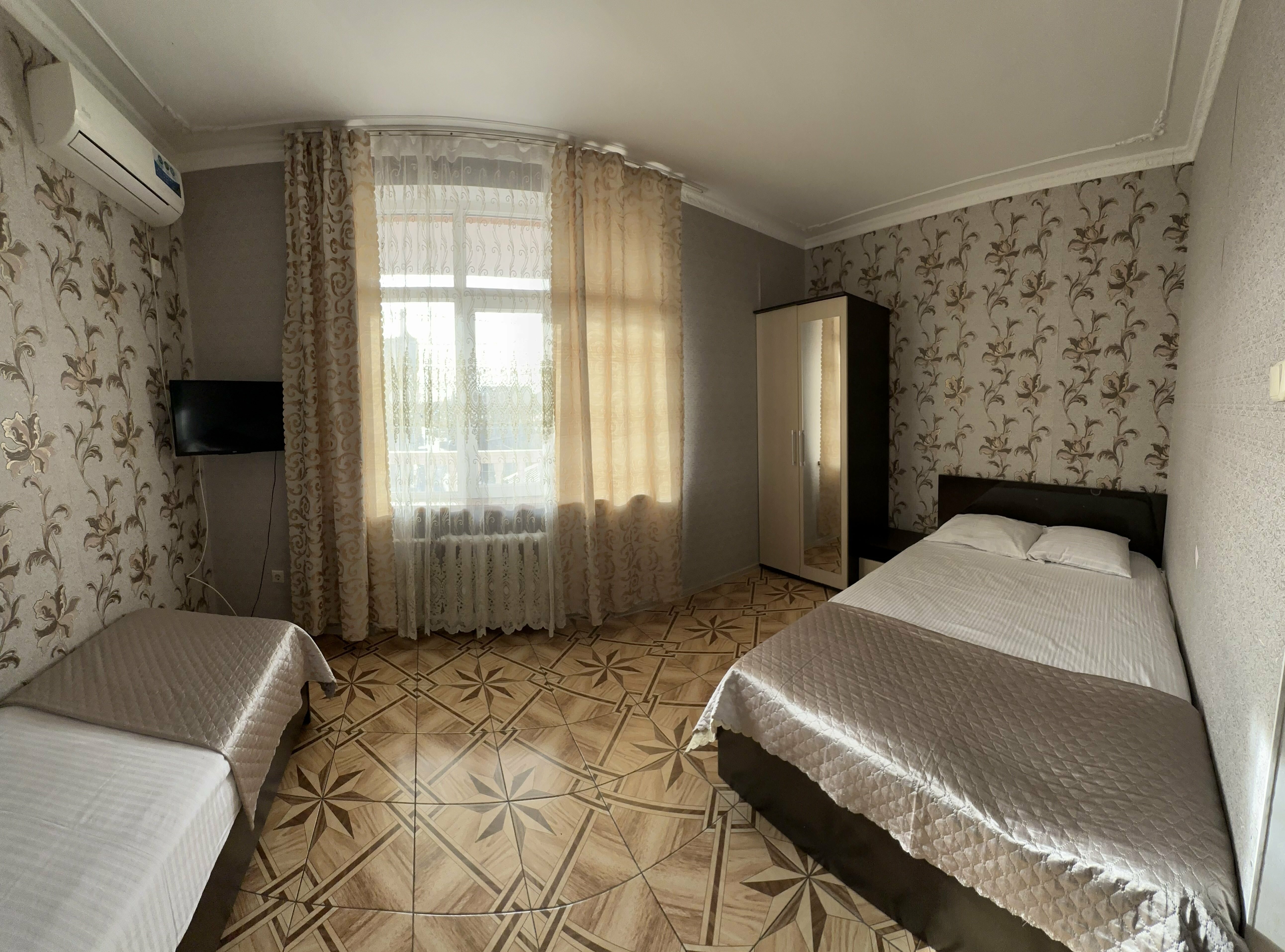 Улучшенный четырехместный номер