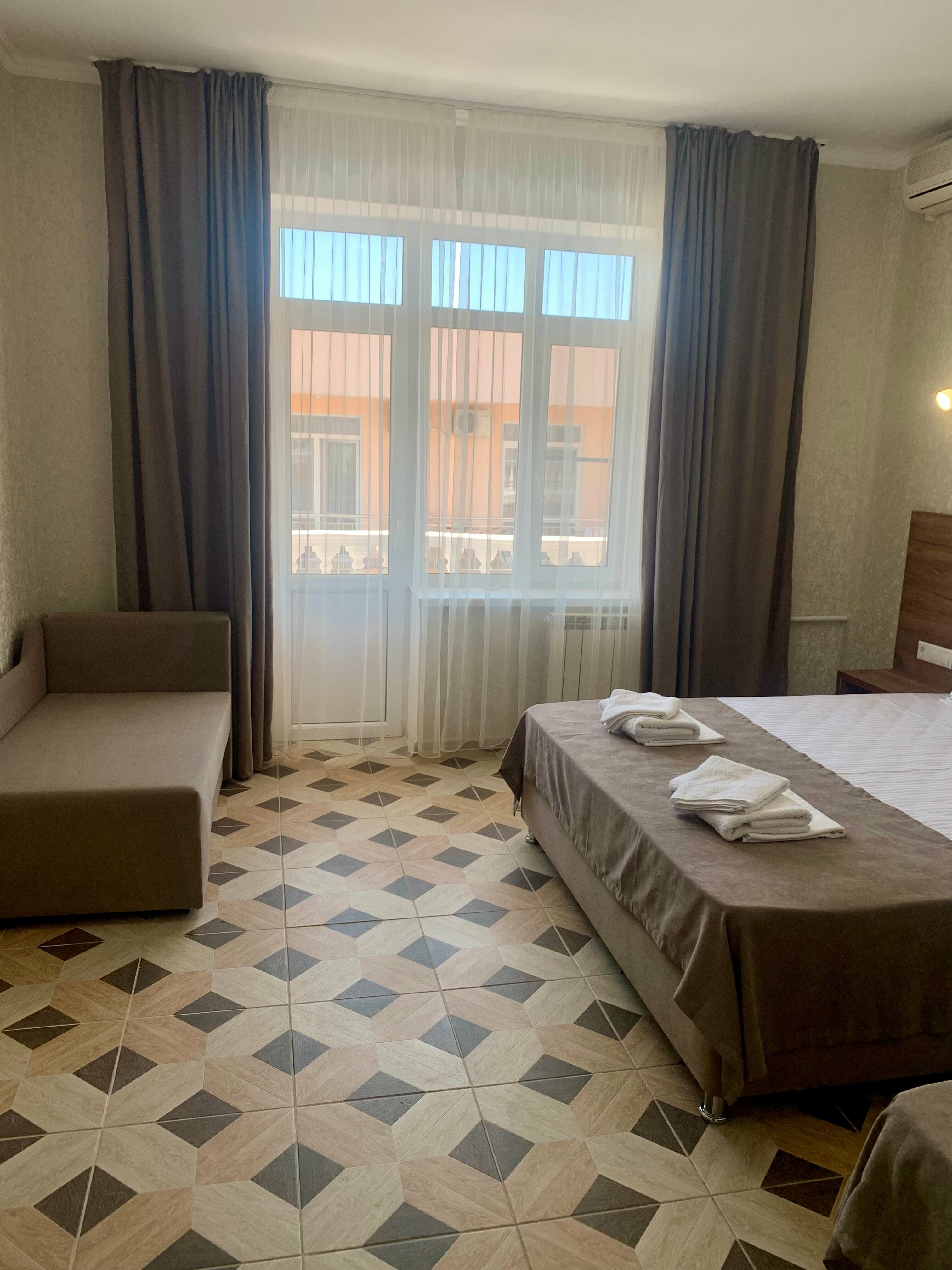 Четырехместный номер Делюкс