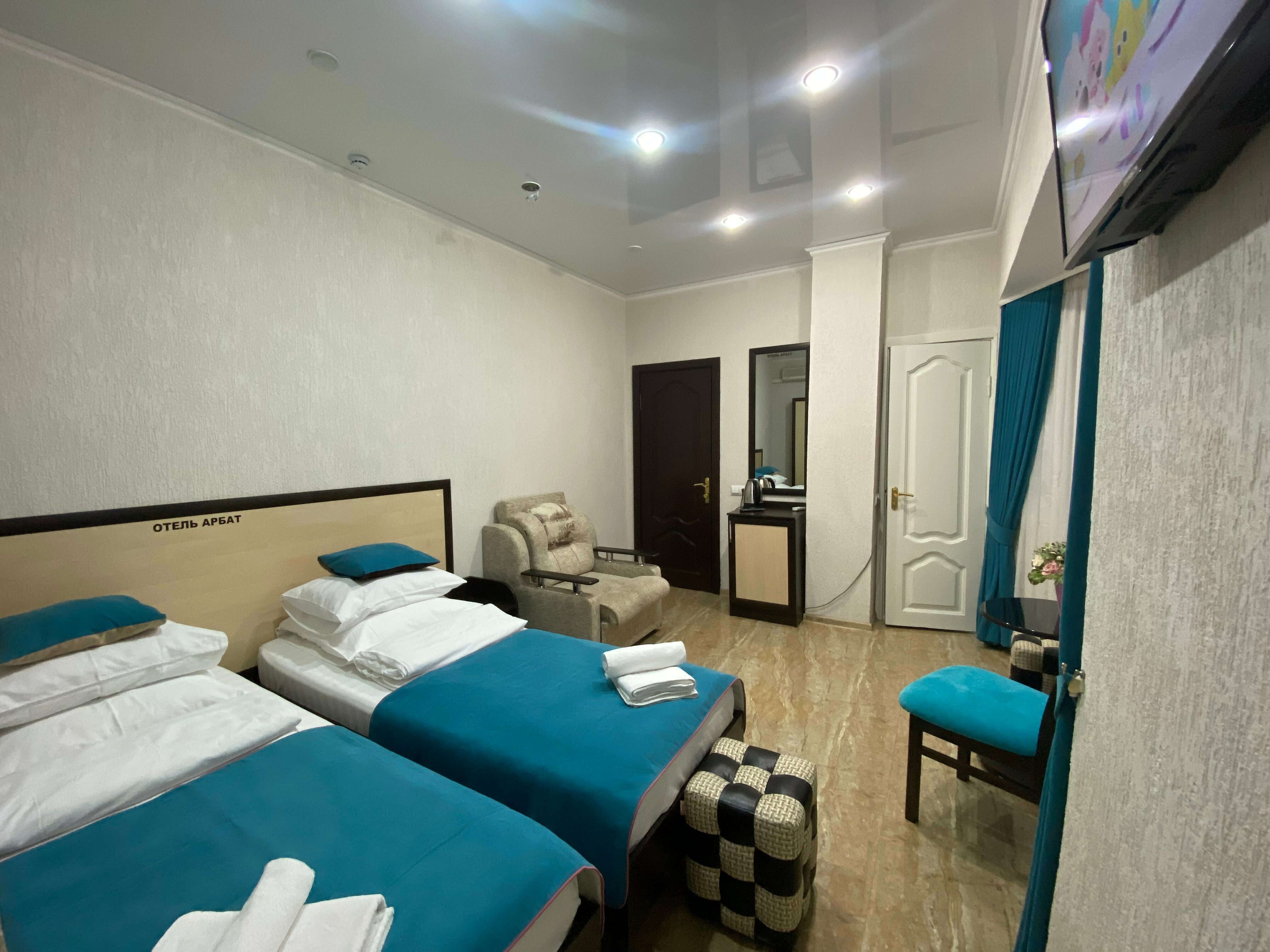 Двухместный номер с 1 кроватью или 2 отдельными кроватями и дополнительной кроватью